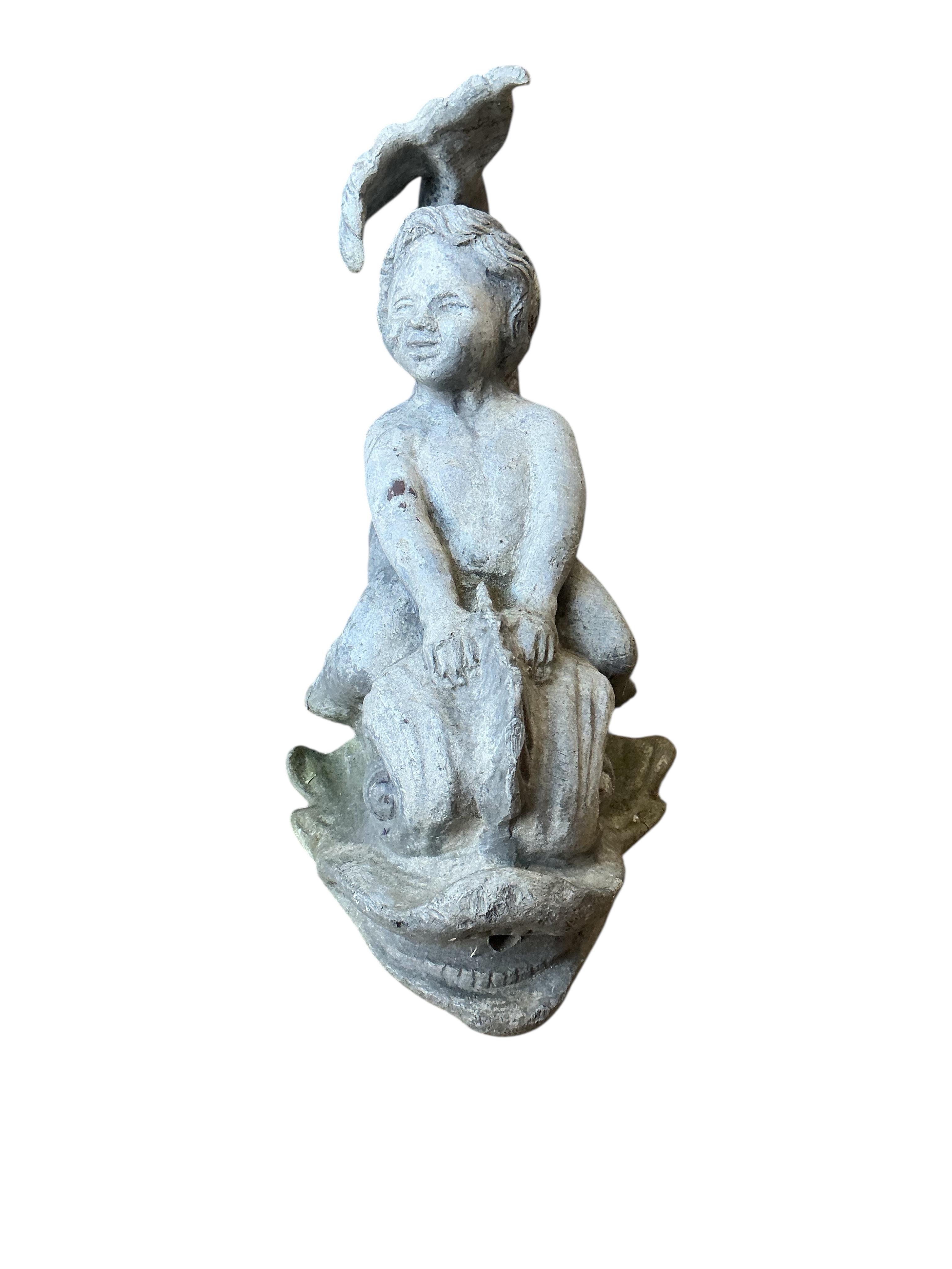 A 19th century lead putti riding a dolphin, height 30cm